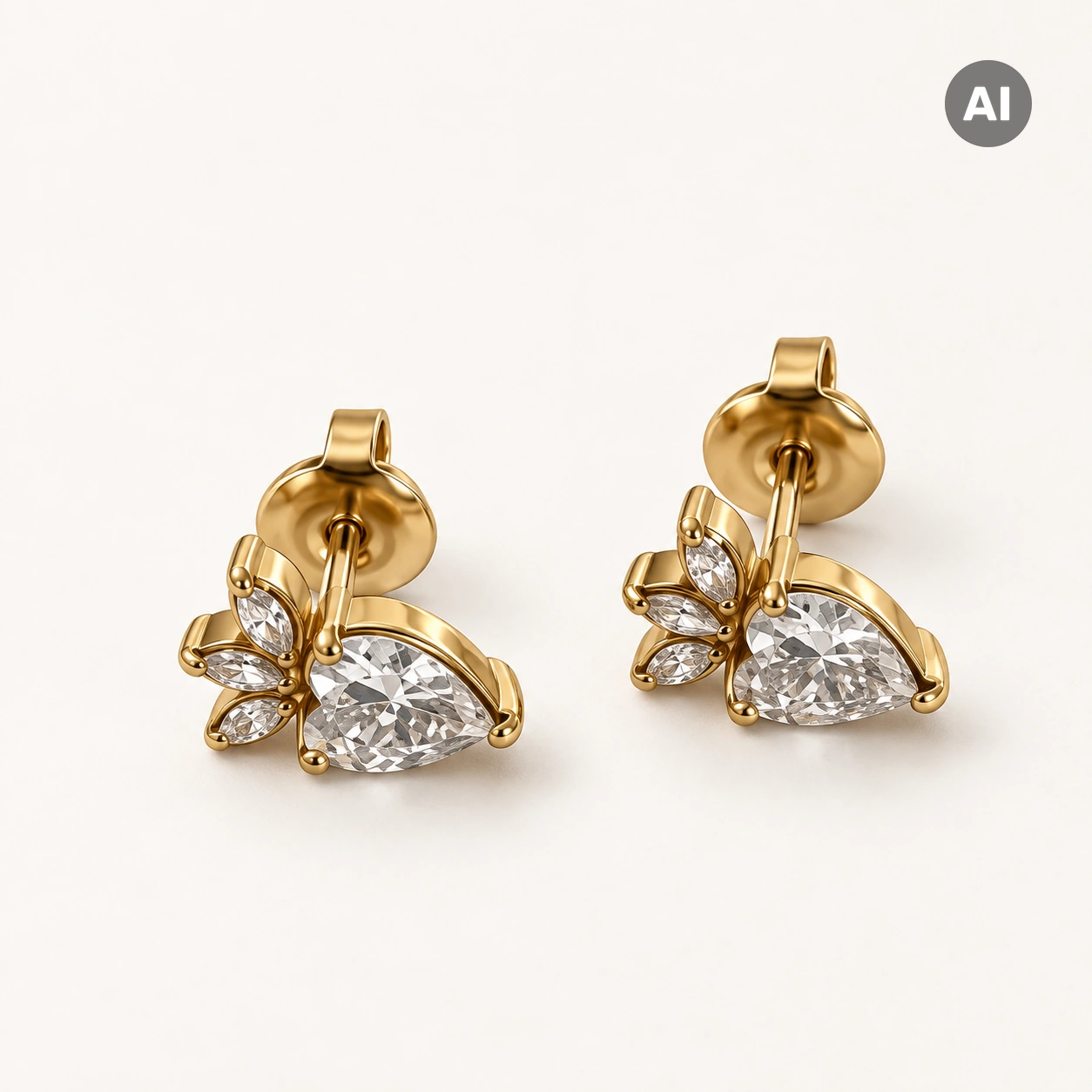 Ohrstecker mit Tropfen-Zirkonia und Marquise-Besatz, goldfarben