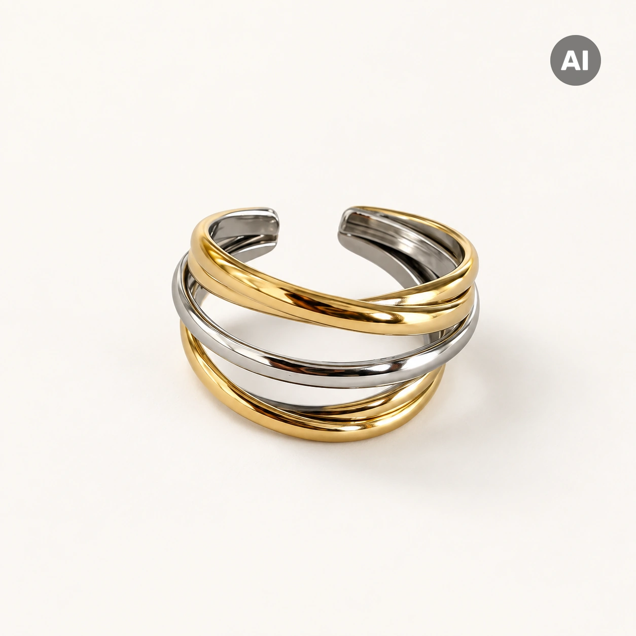 Ring mit offenem Profil und glatten Segmenten, gold- und silberfarben
