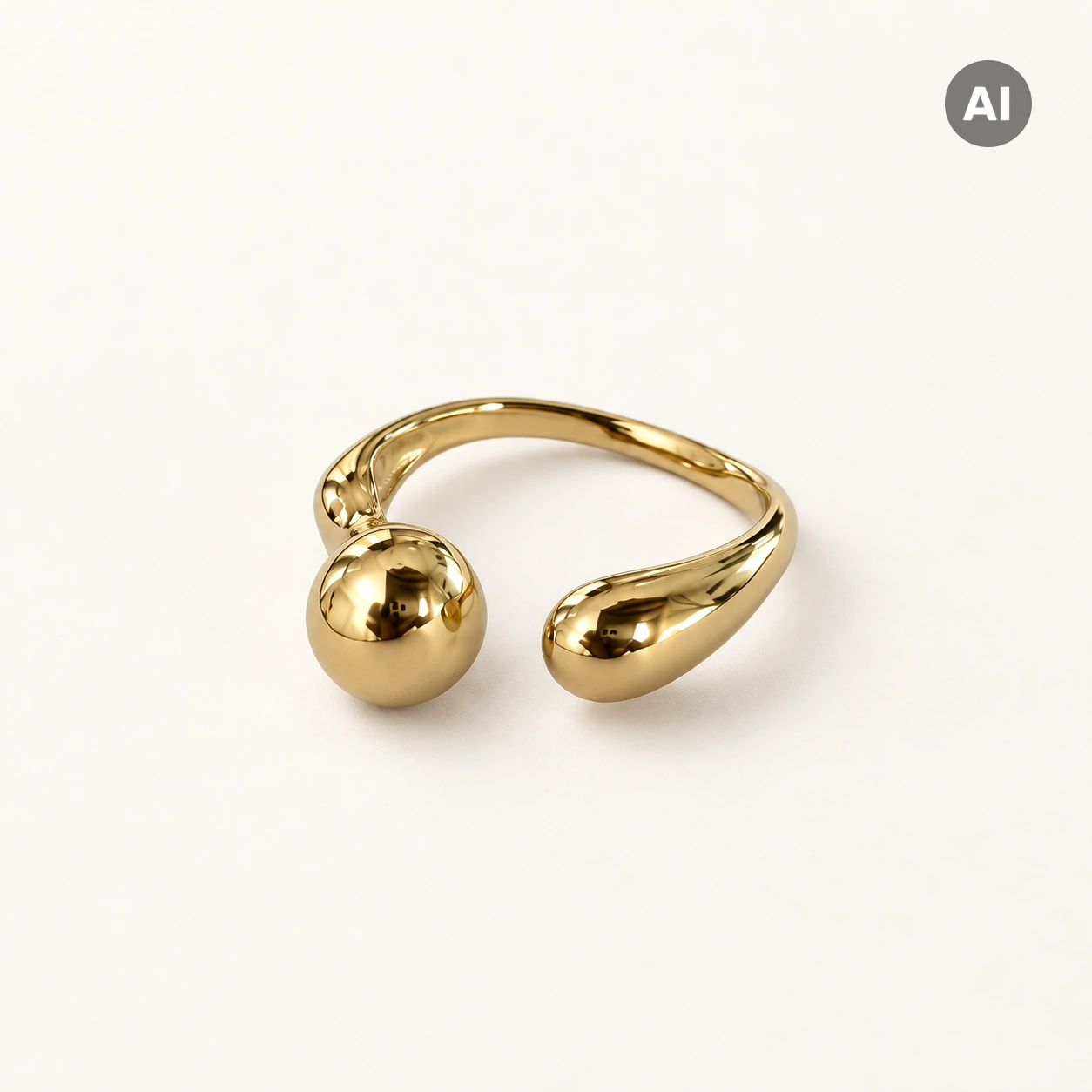 Ring mit offenem Profil, Kugel und Tropfenende, goldfarben