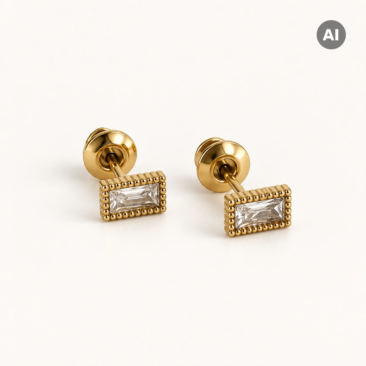 Ohrstecker mit Baguette-Zirkonia und Kugelrand, goldfarben