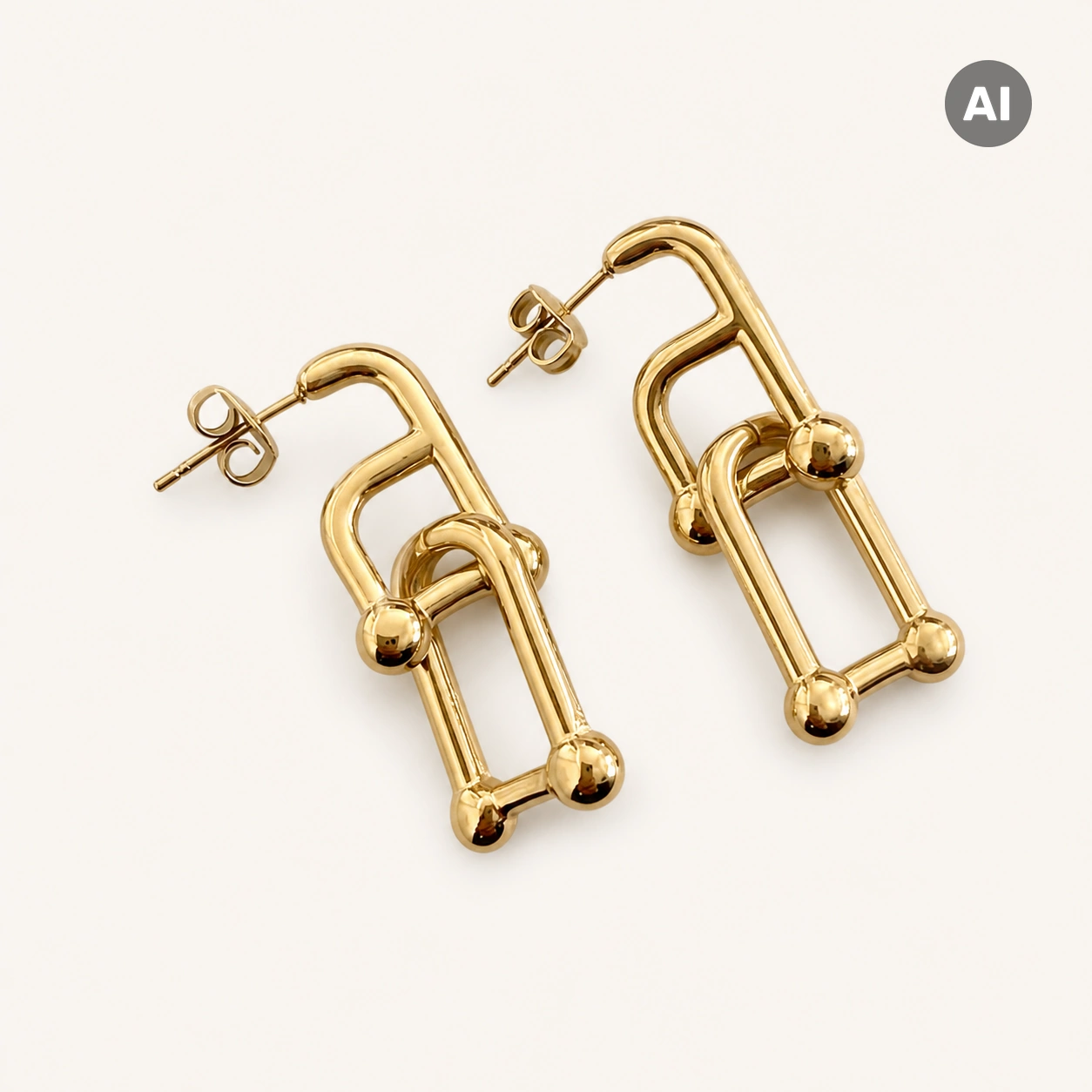 Ohrringe mit hängenden Gliedern und Kugeln, goldfarben