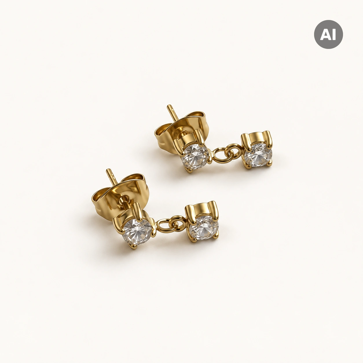 Ohrstecker mit zwei Zirkonia in Krappenfassung, goldfarben