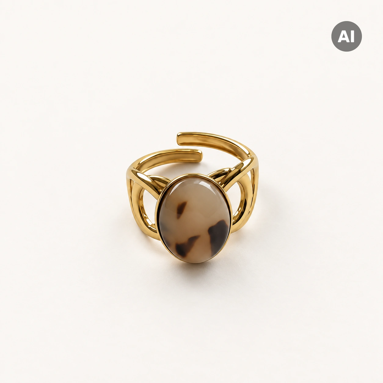 Ring mit braunem Stein, Zarge und offenem Profil, goldfarben