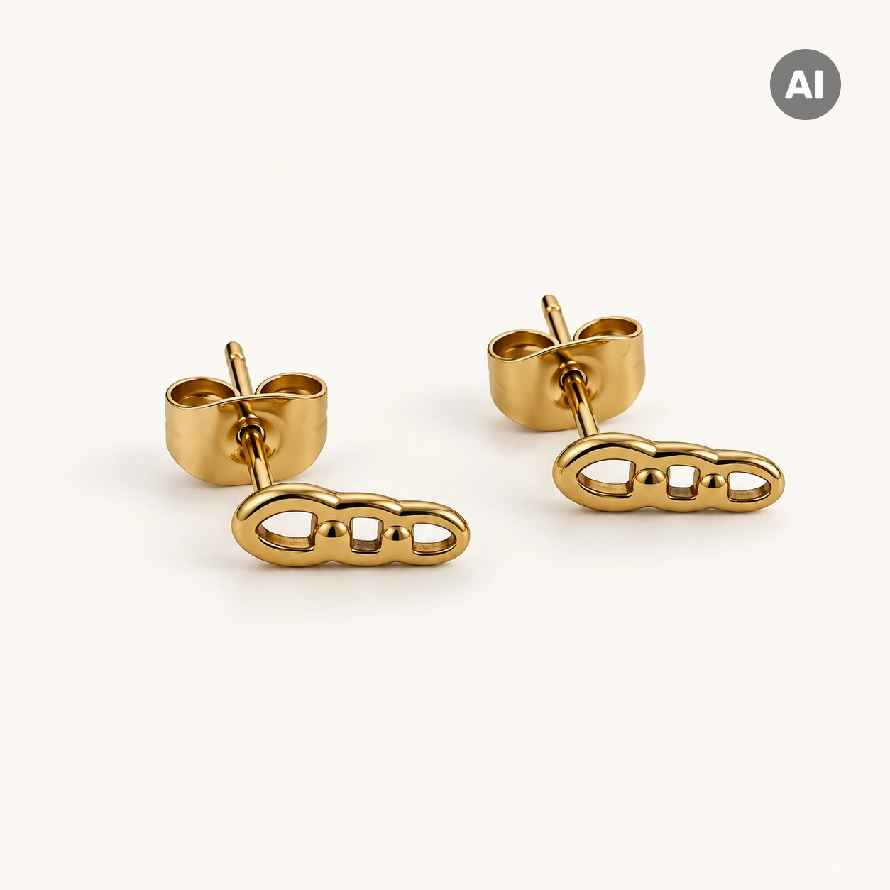 Ohrstecker mit geschwungenem offenem Steg und Kugeln, goldfarben