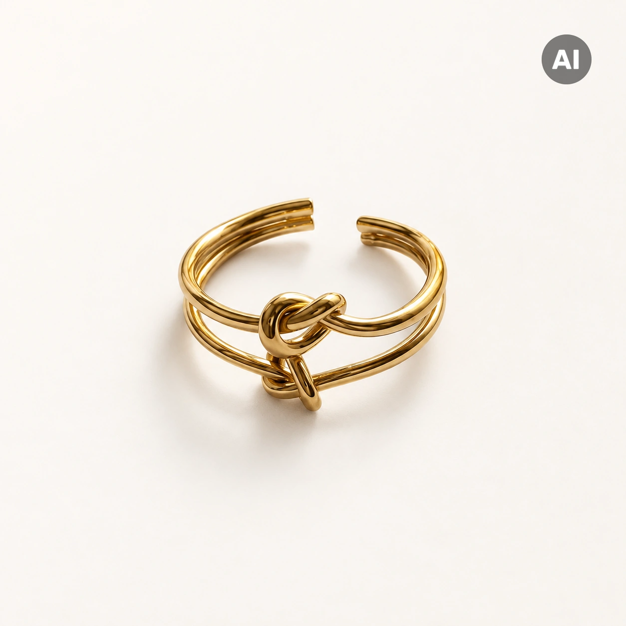 Ring mit offenem Doppelprofil und Doppelknoten, goldfarben