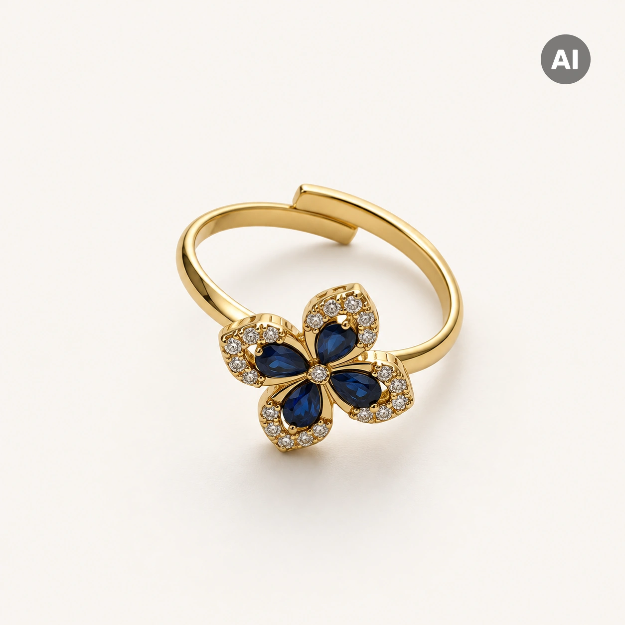 Ring mit offenem Profil und blauer Zirkonia-Blume, goldfarben