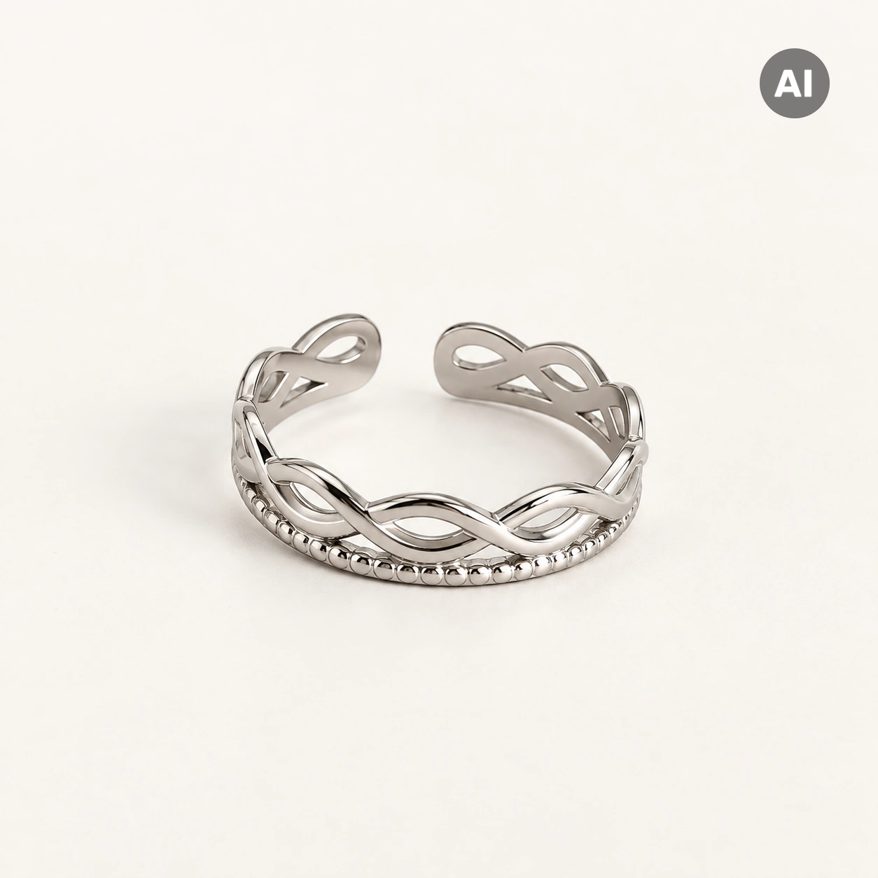 Ring mit offenem geflochtenem Profil und Kugelrand, silberfarben