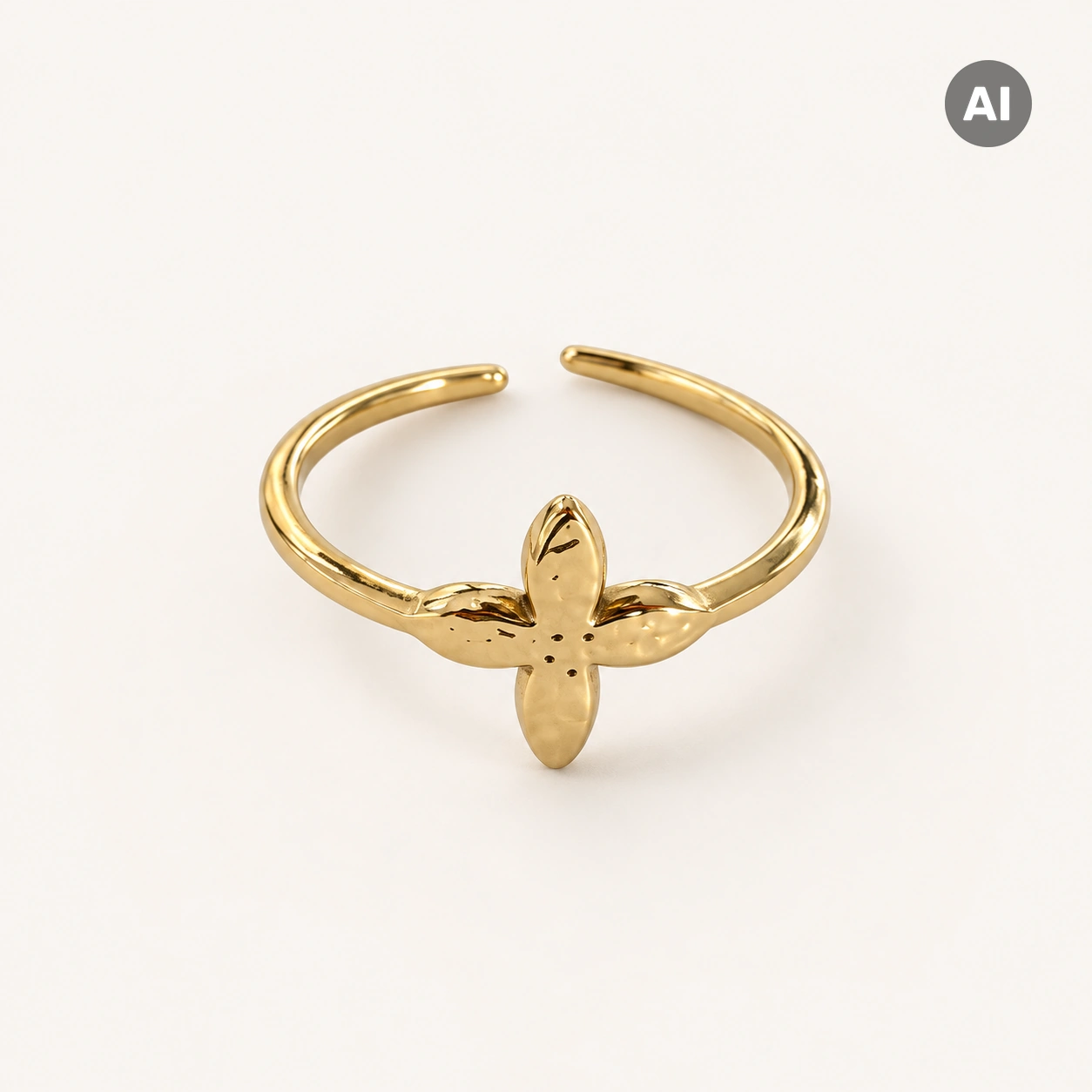 Ring mit offenem Profil und Blüte, goldfarben
